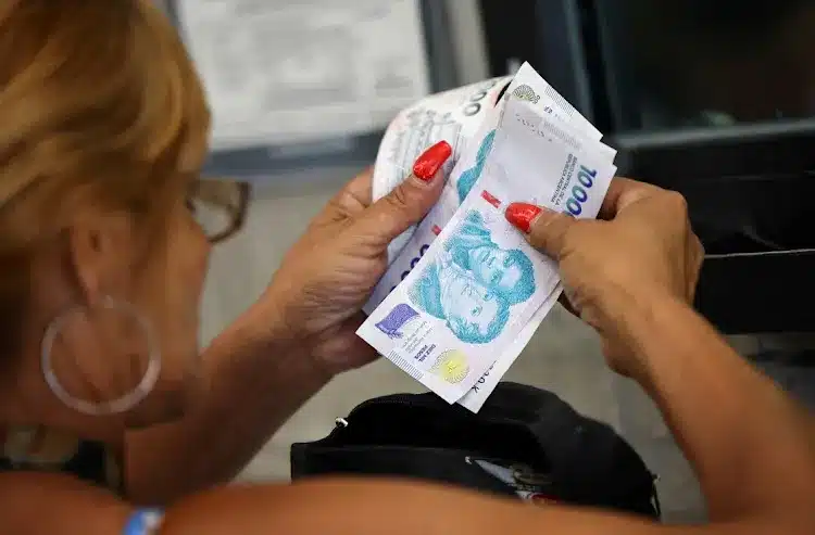 Argentina peso slides after currency and capital controls lightened